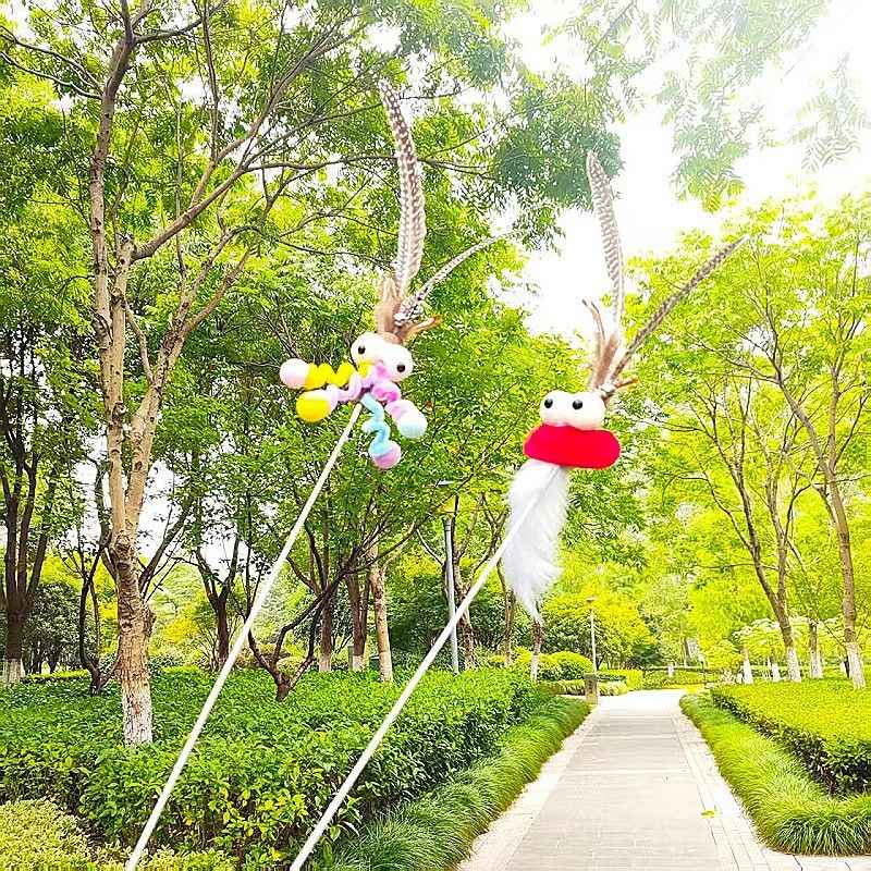 CHIYOOSU Cat Teaser Wand with Feather Bell Pheasant feather duster with extended brown handle (non-extendable)